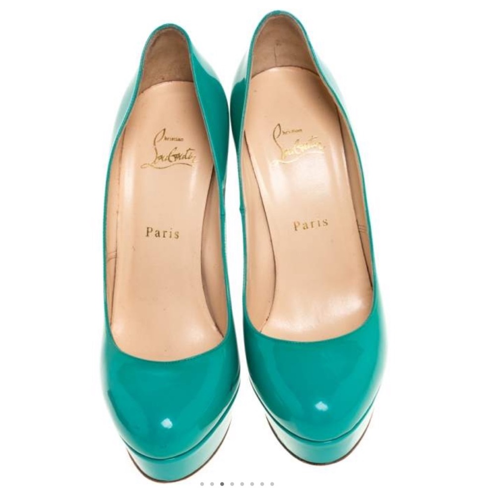 Authentic Christian Louboutin‘s Red bottom heel
